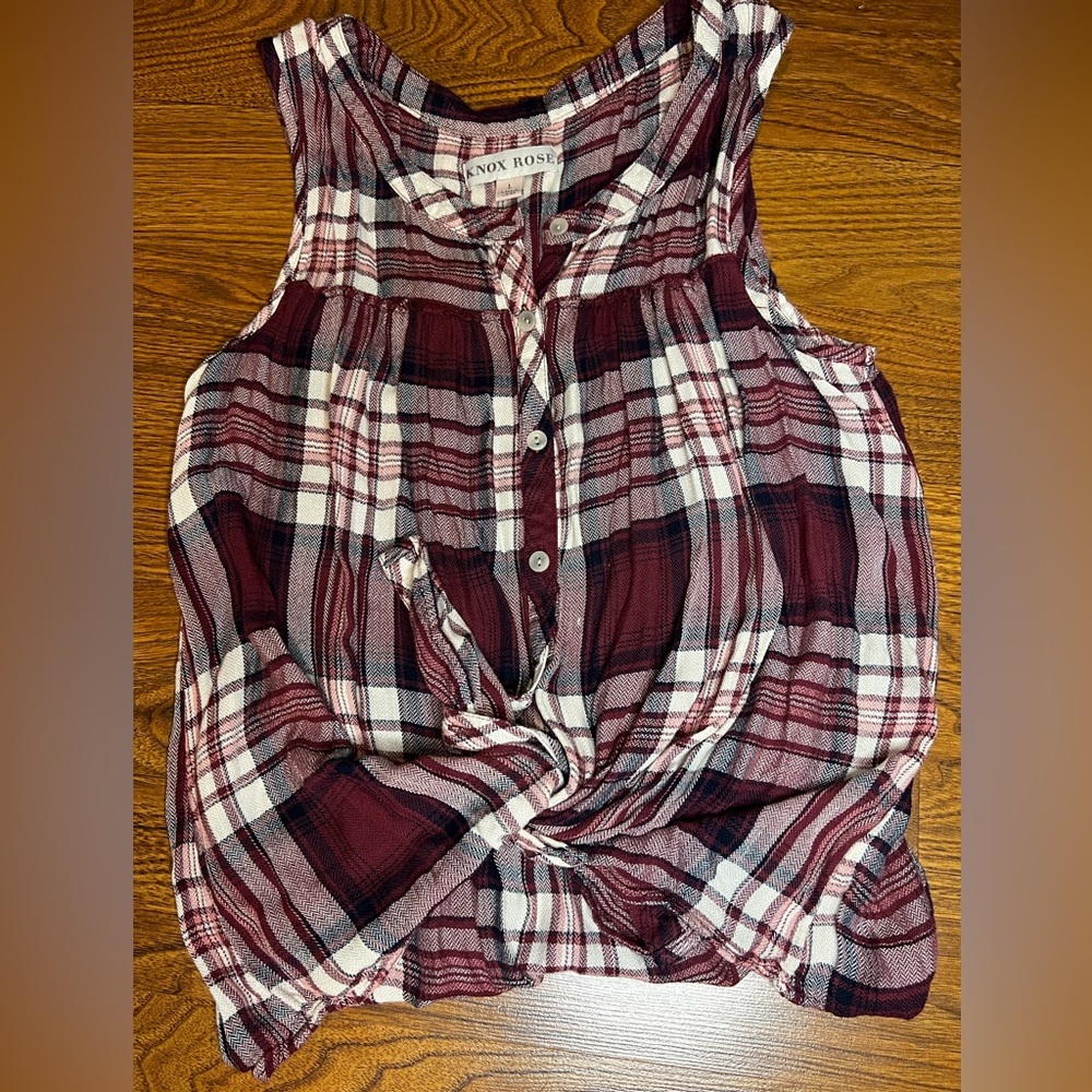 Loose, button up flannel sleeveless top